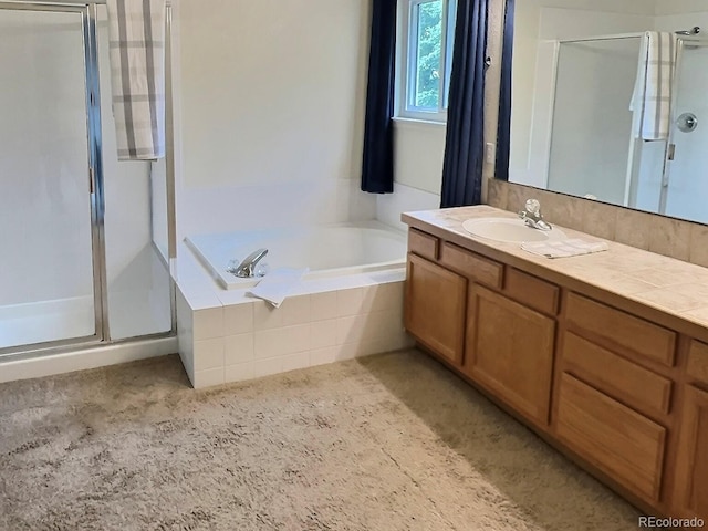 13313 Elizabeth St, Thornton, CO 80241 - bathroom featuring a shower stall, vanity, and a garden tub