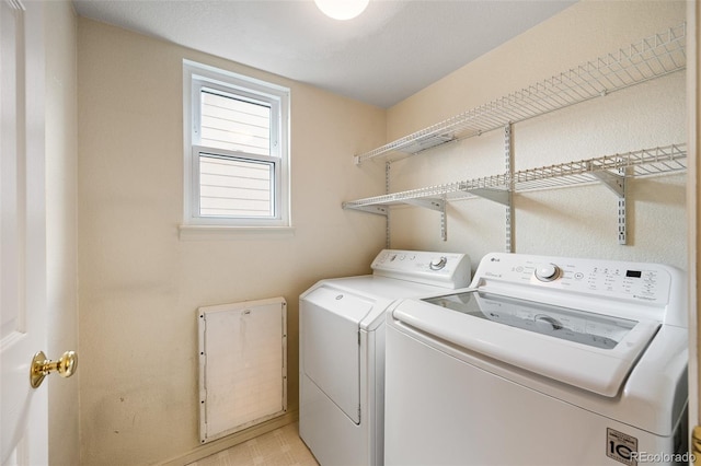 13313 Elizabeth St, Thornton, CO 80241 - laundry room featuring washing machine and clothes dryer