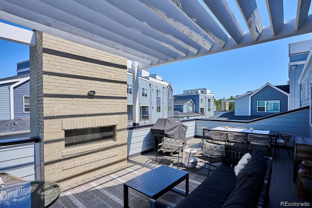 888 S Valentia St Unit 20-101, Denver, CO 80247 - wooden terrace with an outdoor hangout area, a residential view, area for grilling, and a patio area