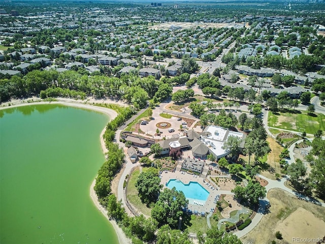 888 S Valentia St Unit 20-101, Denver, CO 80247 - aerial view of property and surrounding area with a pool and a nearby body of water