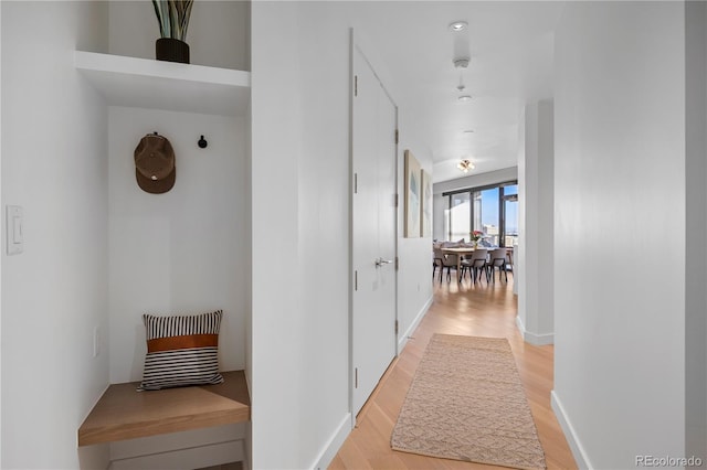 1750 Wewatta St Unit 1720, Denver, CO 80202 - hallway with light wood-type flooring and baseboards