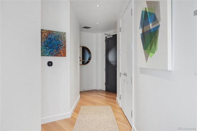 1750 Wewatta St Unit 1720, Denver, CO 80202 - hallway featuring light wood-type flooring, baseboards, and recessed lighting