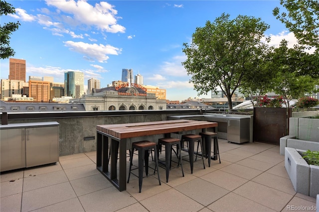 1750 Wewatta St Unit 1720, Denver, CO 80202 - view of patio / terrace featuring a skyline view