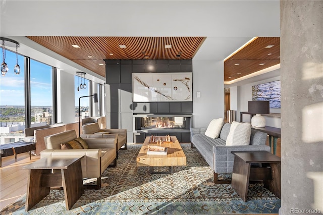 1750 Wewatta St Unit 1720, Denver, CO 80202 - living room with recessed lighting, wood finished floors, and wood ceiling