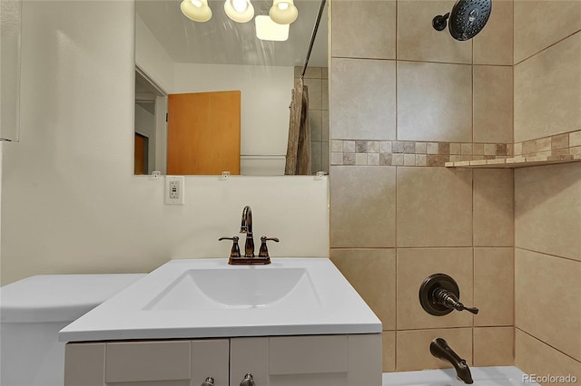 bathroom featuring toilet, vanity, and shower / bath combination with curtain