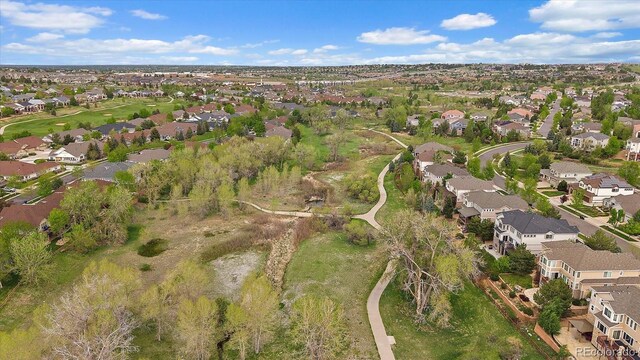aerial overview of property's location with nearby suburban area
