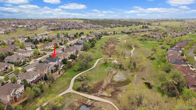 7829 S Coolidge Way, Aurora, CO 80016 - aerial view of property and surrounding area featuring nearby suburban area