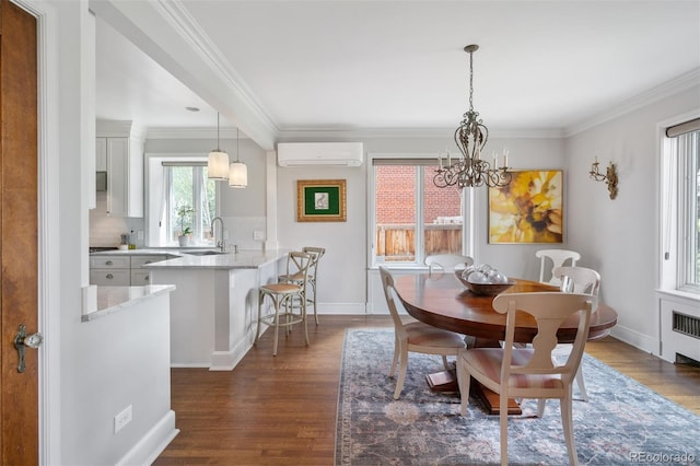 dining area featuring a wall mounted air conditioner, a notable chandelier, crown molding, dark wood-type flooring, and baseboards