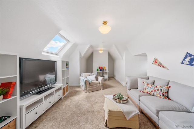 living area featuring light colored carpet and vaulted ceiling with skylight