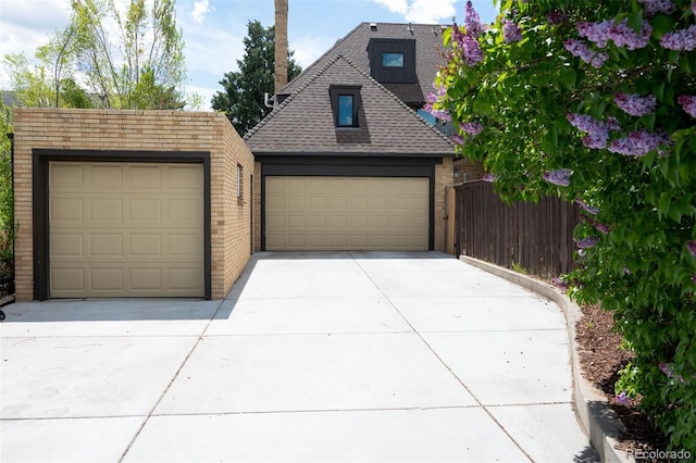 detached garage with fence