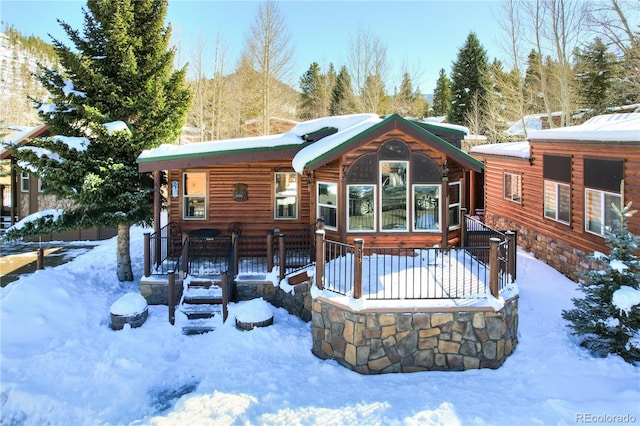 view of snow covered property