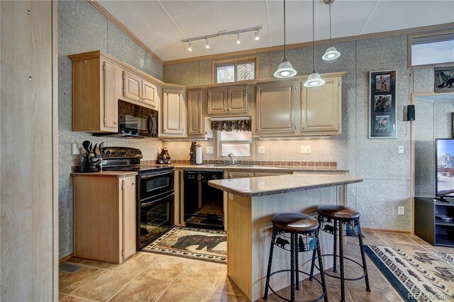 kitchen with crown molding, pendant lighting, a kitchen bar, a kitchen island, and black appliances