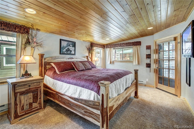 carpeted bedroom featuring baseboard heating and wooden ceiling