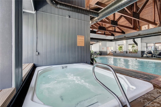 view of pool with ceiling fan