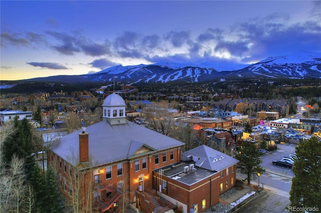 aerial view at dusk with a mountain view