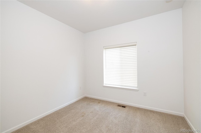 view of carpeted spare room