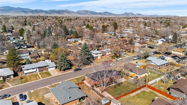 bird's eye view featuring a mountain view and a residential view