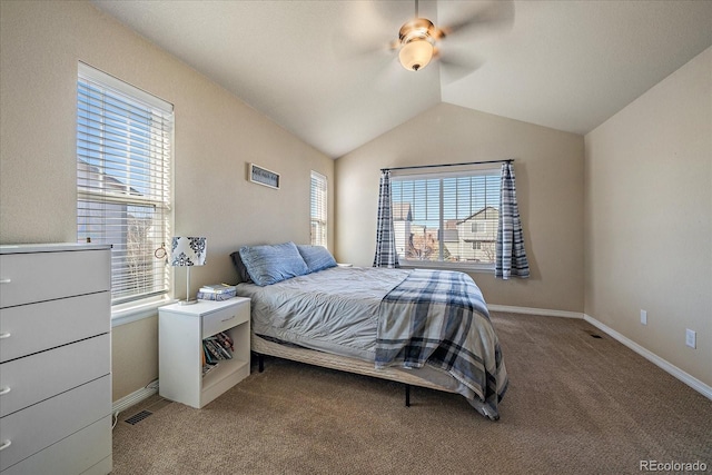 bedroom featuring light carpet, ceiling fan, baseboards, and lofted ceiling