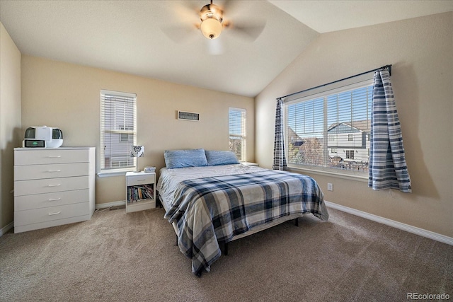 bedroom featuring vaulted ceiling, carpet floors, and baseboards