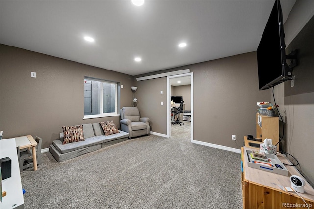 carpeted living room with recessed lighting and baseboards