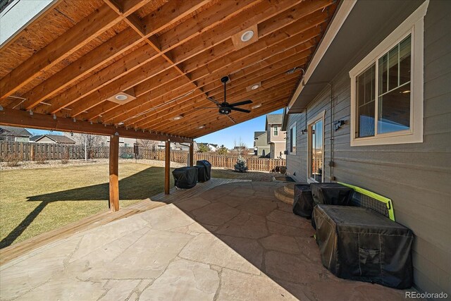 view of patio / terrace with a fenced backyard and a ceiling fan