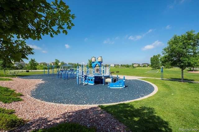 community jungle gym with a yard