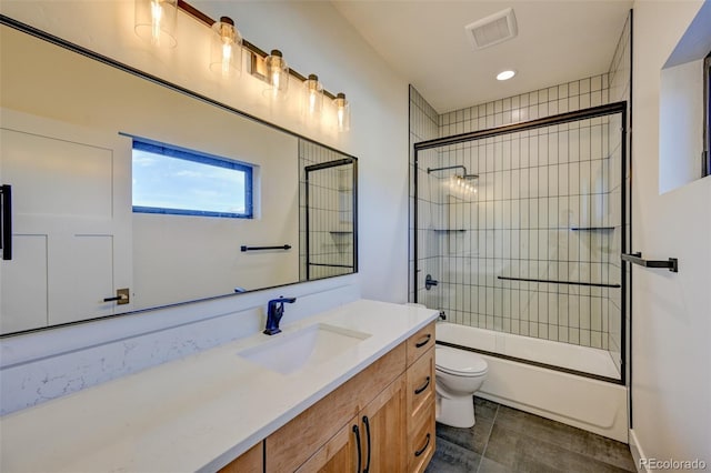 717 Marquette Ave, Buena Vista, CO 81211 - full bathroom featuring vanity, combined bath / shower with glass door, tile patterned flooring, and recessed lighting