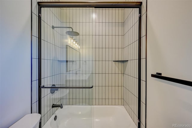 717 Marquette Ave, Buena Vista, CO 81211 - bathroom featuring toilet and enclosed tub / shower combo