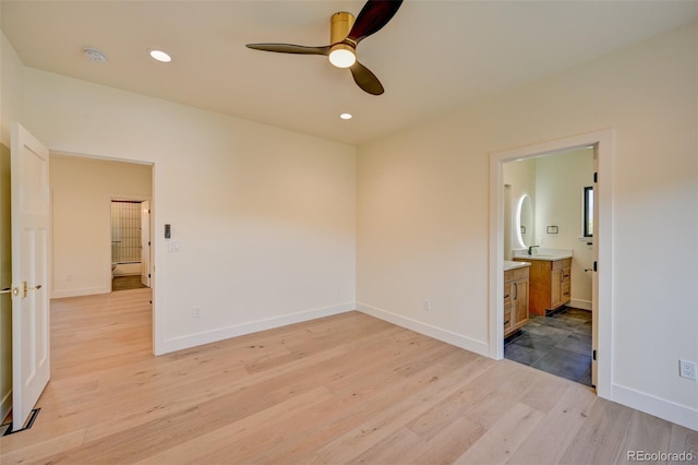 717 Marquette Ave, Buena Vista, CO 81211 - unfurnished bedroom featuring light wood-style flooring, recessed lighting, and ensuite bath