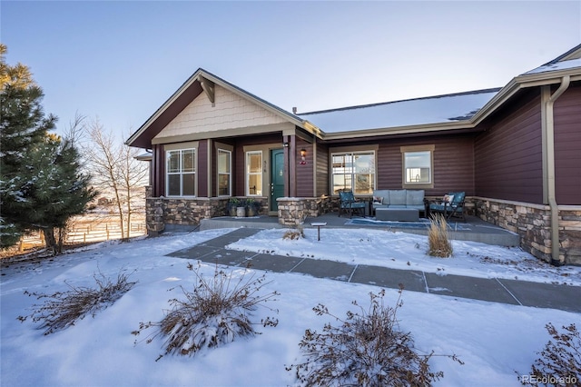 view of front of house featuring an outdoor living space