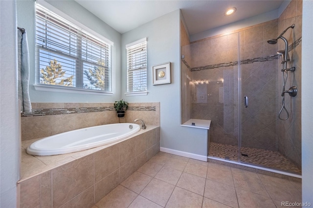 bathroom with tile patterned flooring and independent shower and bath