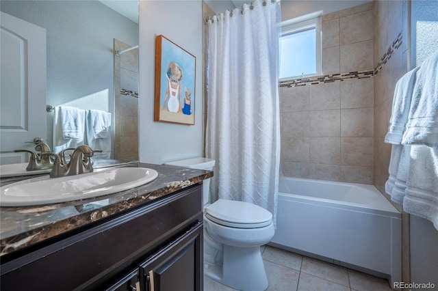 full bathroom with toilet, shower / tub combo, vanity, and tile patterned floors