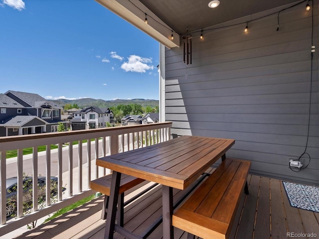 10258 W Coal Mine Pl, Littleton, CO 80127 - balcony with a mountain view, a residential view, and outdoor dining space