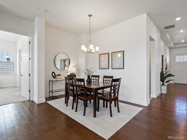 10258 W Coal Mine Pl, Littleton, CO 80127 - dining area featuring dark wood-style floors, baseboards, a chandelier, and recessed lighting