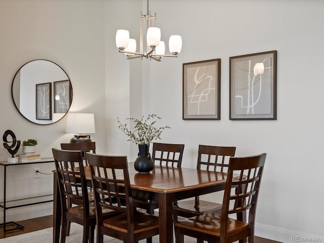 10258 W Coal Mine Pl, Littleton, CO 80127 - dining area with a chandelier and baseboards