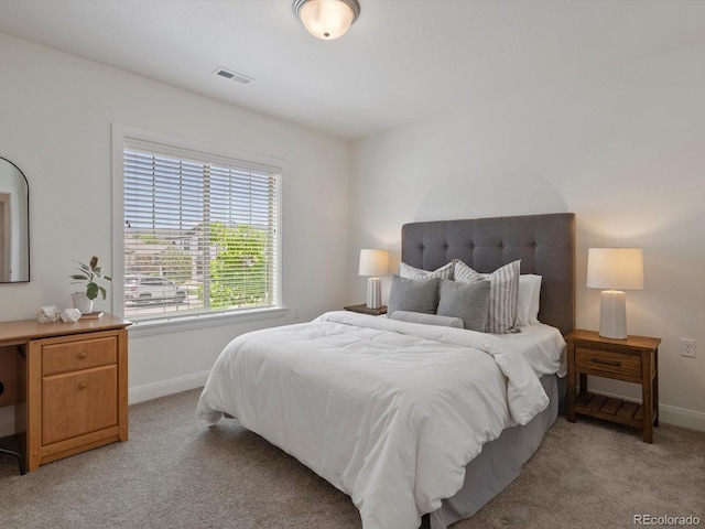 10258 W Coal Mine Pl, Littleton, CO 80127 - bedroom featuring light colored carpet and baseboards