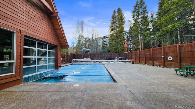 view of pool with a patio area