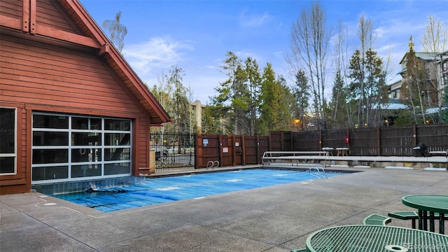 view of pool featuring a patio