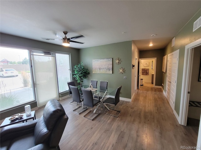 15354 W 64th Ln Unit 108, Arvada, CO 80007 - dining area with hardwood / wood-style flooring, a ceiling fan, and recessed lighting