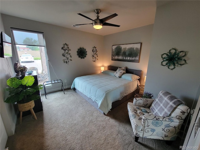 15354 W 64th Ln Unit 108, Arvada, CO 80007 - bedroom with carpet and ceiling fan
