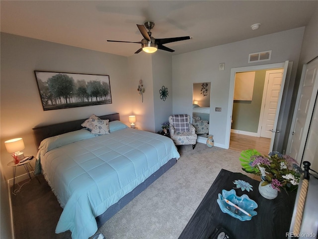15354 W 64th Ln Unit 108, Arvada, CO 80007 - carpeted bedroom with a ceiling fan and baseboards