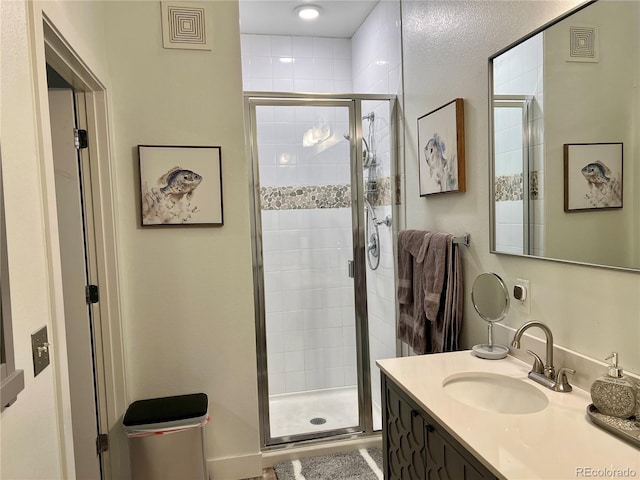 15354 W 64th Ln Unit 108, Arvada, CO 80007 - full bathroom with vanity and a shower stall