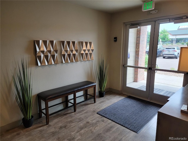 15354 W 64th Ln Unit 108, Arvada, CO 80007 - entryway with french doors, plenty of natural light, and wood finished floors