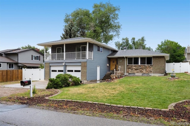6455 Field St, Arvada, CO 80004 - tri-level home with an attached garage, a gate, driveway, and brick siding