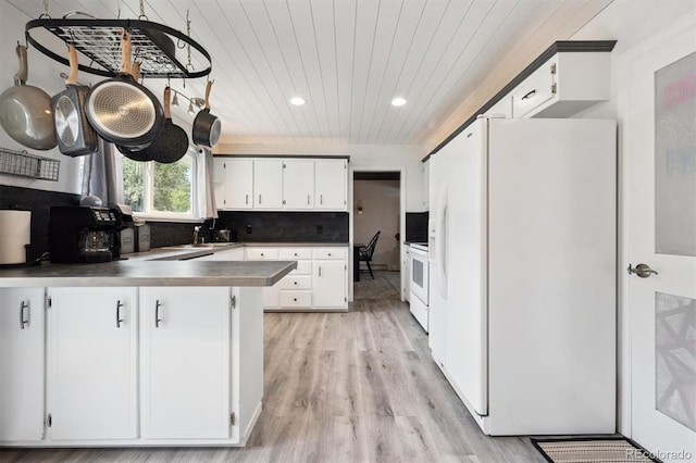 6455 Field St, Arvada, CO 80004 - kitchen featuring white refrigerator with ice dispenser, a peninsula, light wood-style flooring, stove, and wood ceiling