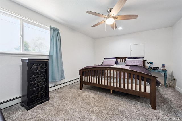 6455 Field St, Arvada, CO 80004 - bedroom with baseboard heating, carpet flooring, and a ceiling fan
