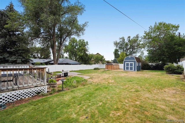 6455 Field St, Arvada, CO 80004 - view of yard featuring a shed and a deck
