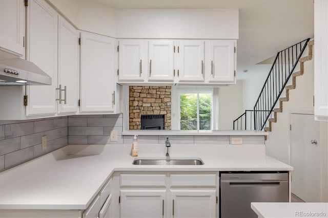 2933 W 81st Ave Unit F, Westminster, CO 80031 - kitchen with dishwasher, light countertops, white cabinetry, and tasteful backsplash