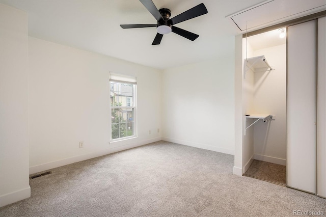 2933 W 81st Ave Unit F, Westminster, CO 80031 - unfurnished bedroom with attic access, carpet flooring, and ceiling fan