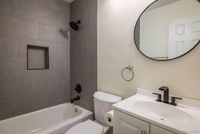 2933 W 81st Ave Unit F, Westminster, CO 80031 - bathroom featuring vanity and bathtub / shower combination